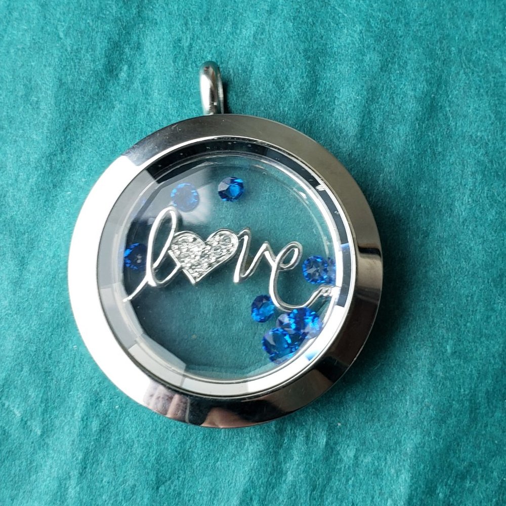 2/20$ Origami Owl silver tone locket love and blue crystals
